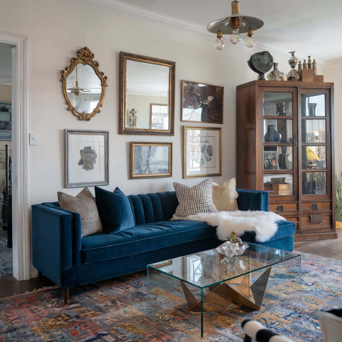 eclectic living room decor dark tones blue couch