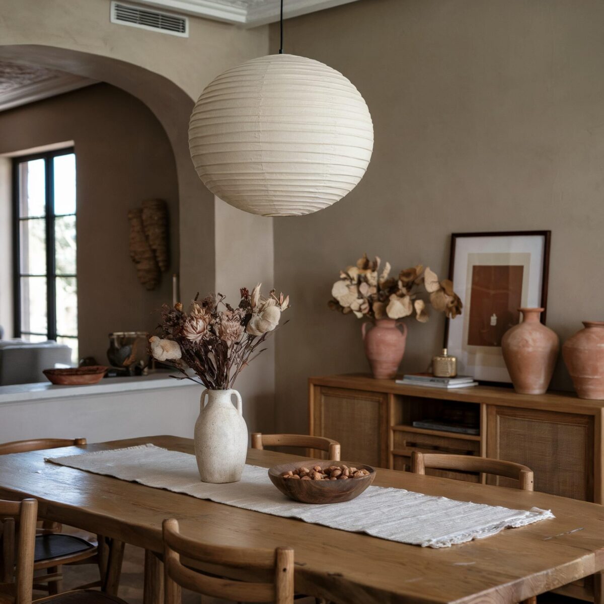 eclectic living room open concept brown dining table brown chairs