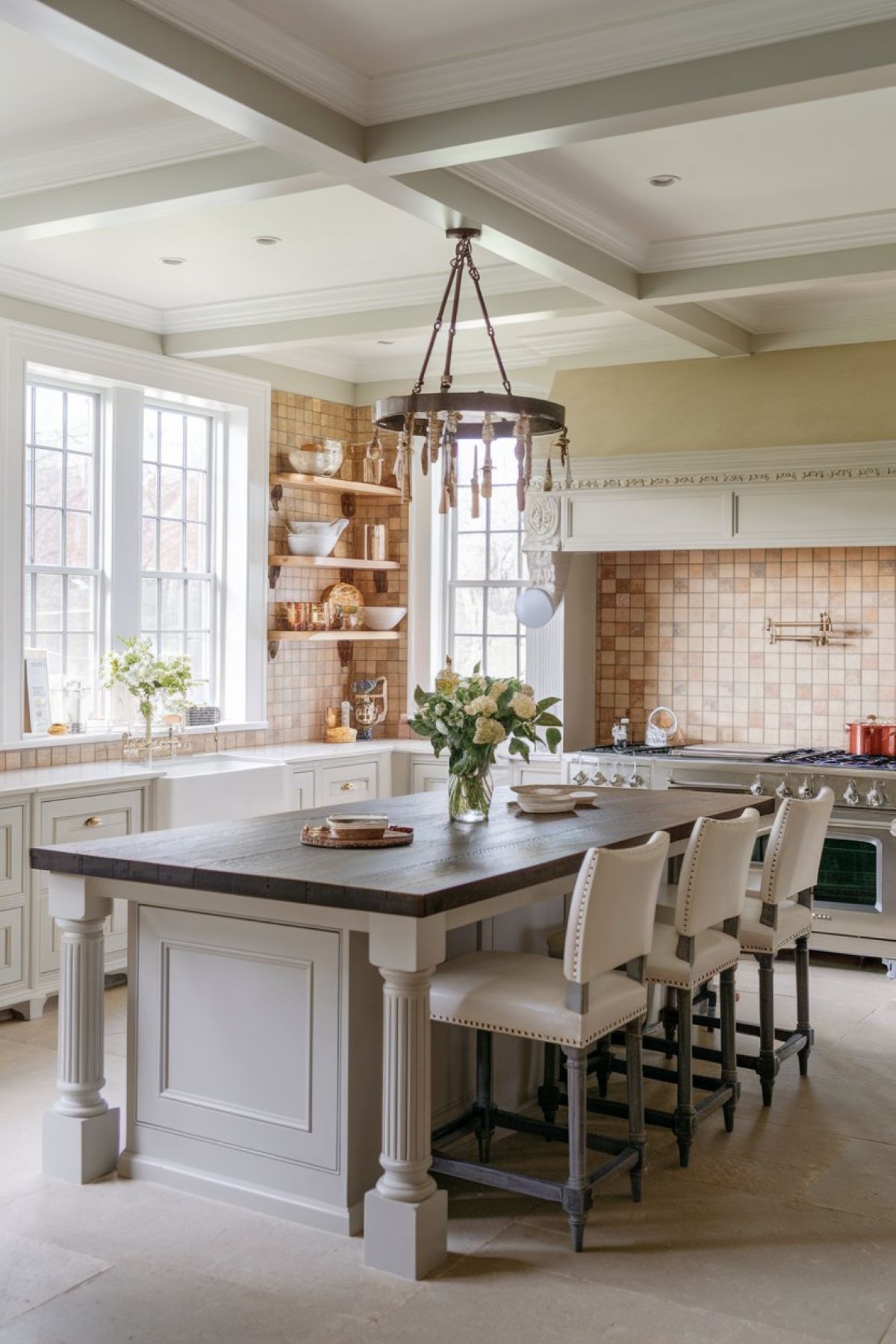 elegant luxury farmhouse kitchen with high end finishes and modern appliances