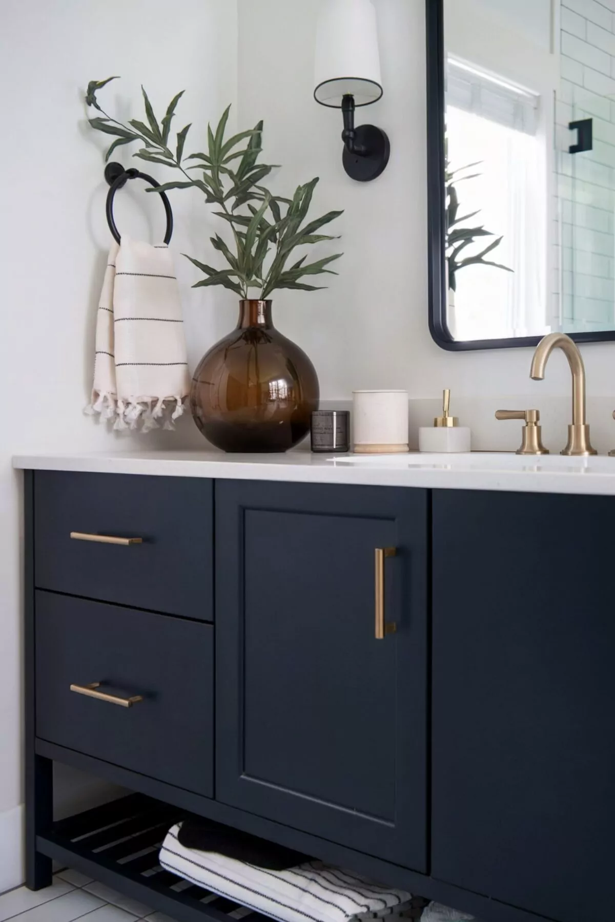farmhouse bathroom vanity faucets has a white countertop and gold faucet