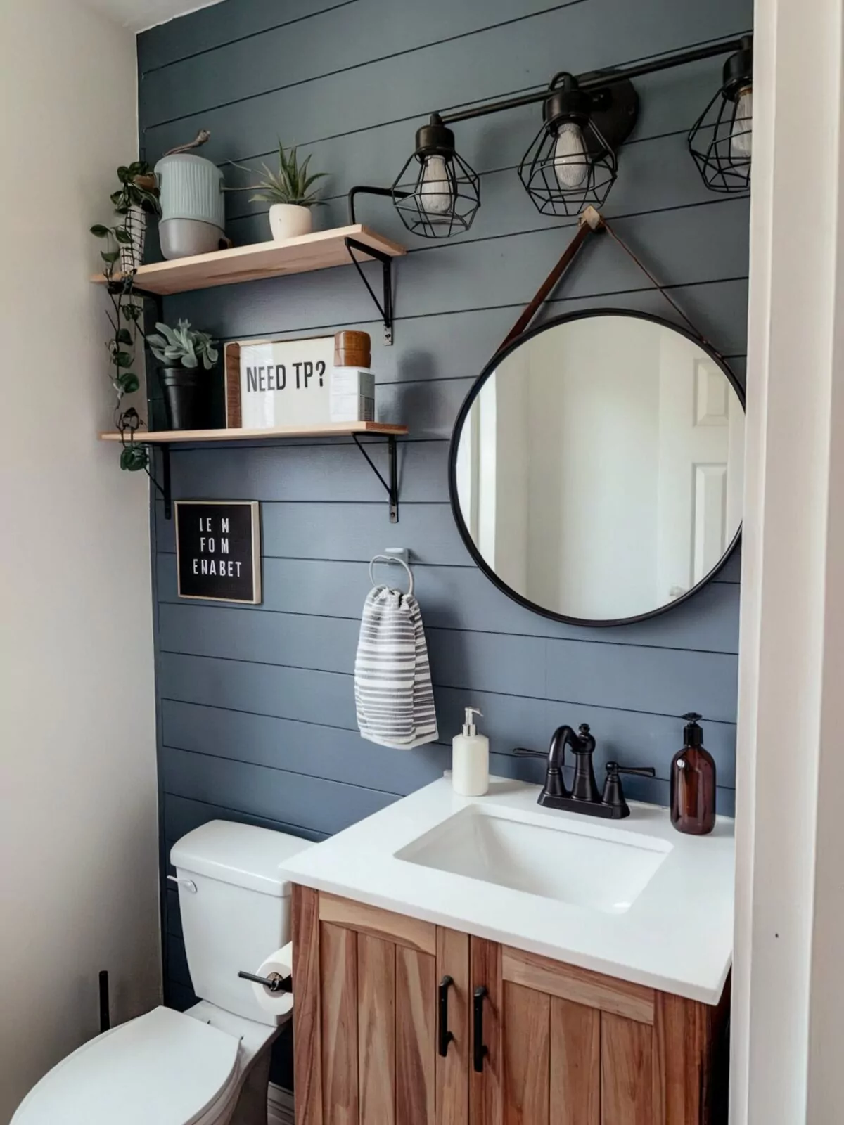 half bathroom vanity ideas farmhouse a blue gray shiplap wall adorned with a circular mirror