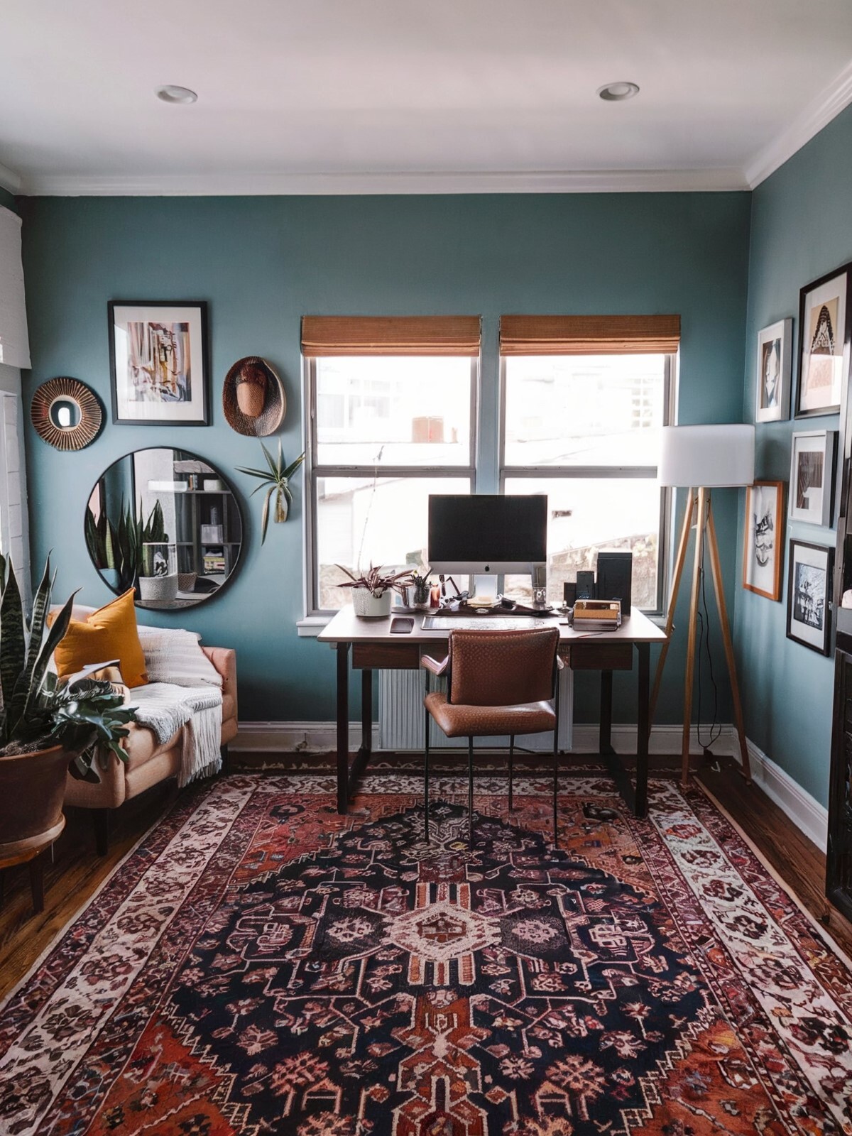 large home office boho well decorated room with walls painted in a calming shade of blue