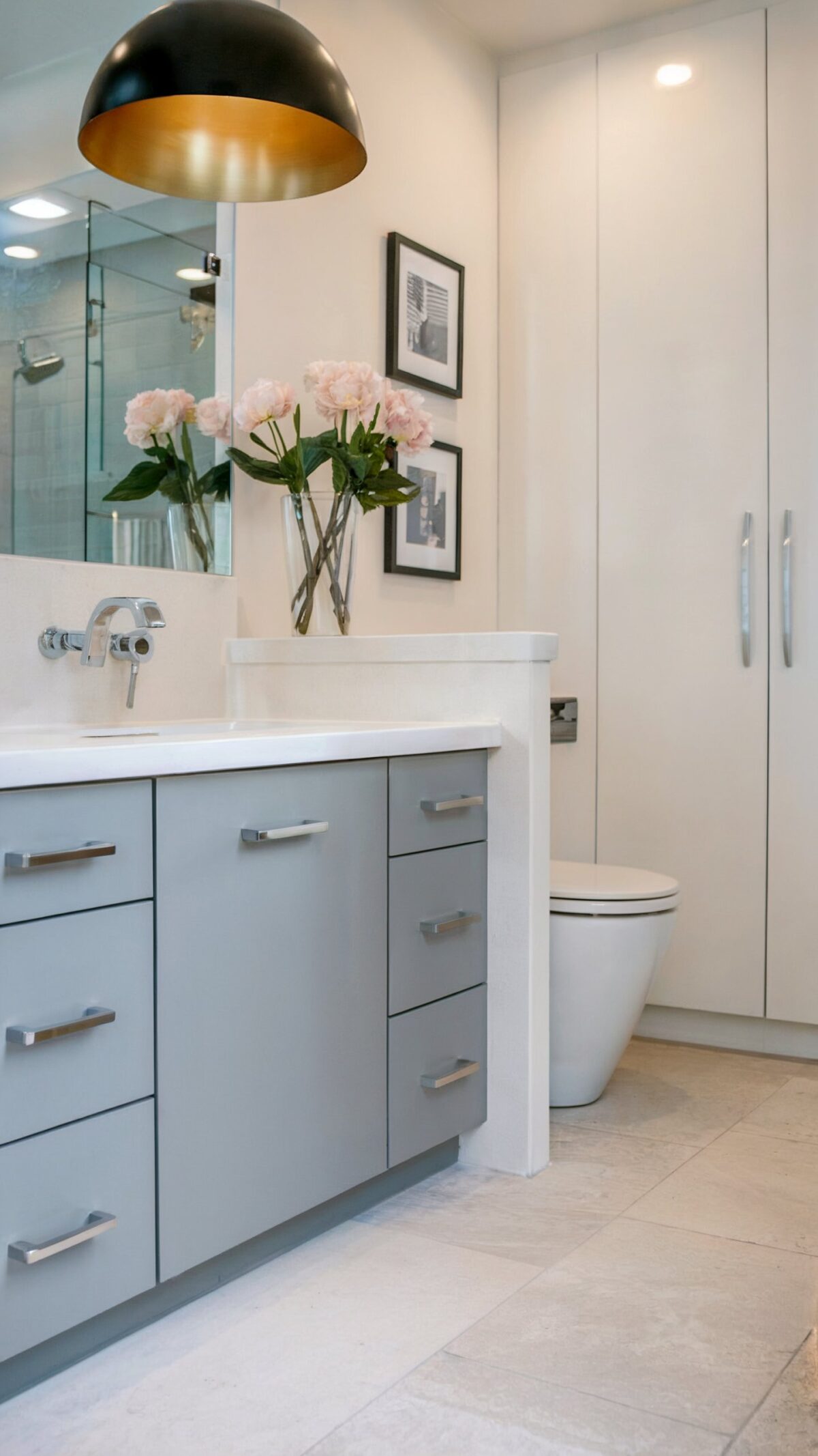 luxury vinyl tile bathroom click with a bathroom vanity with a gray cabinet below and a white countertop