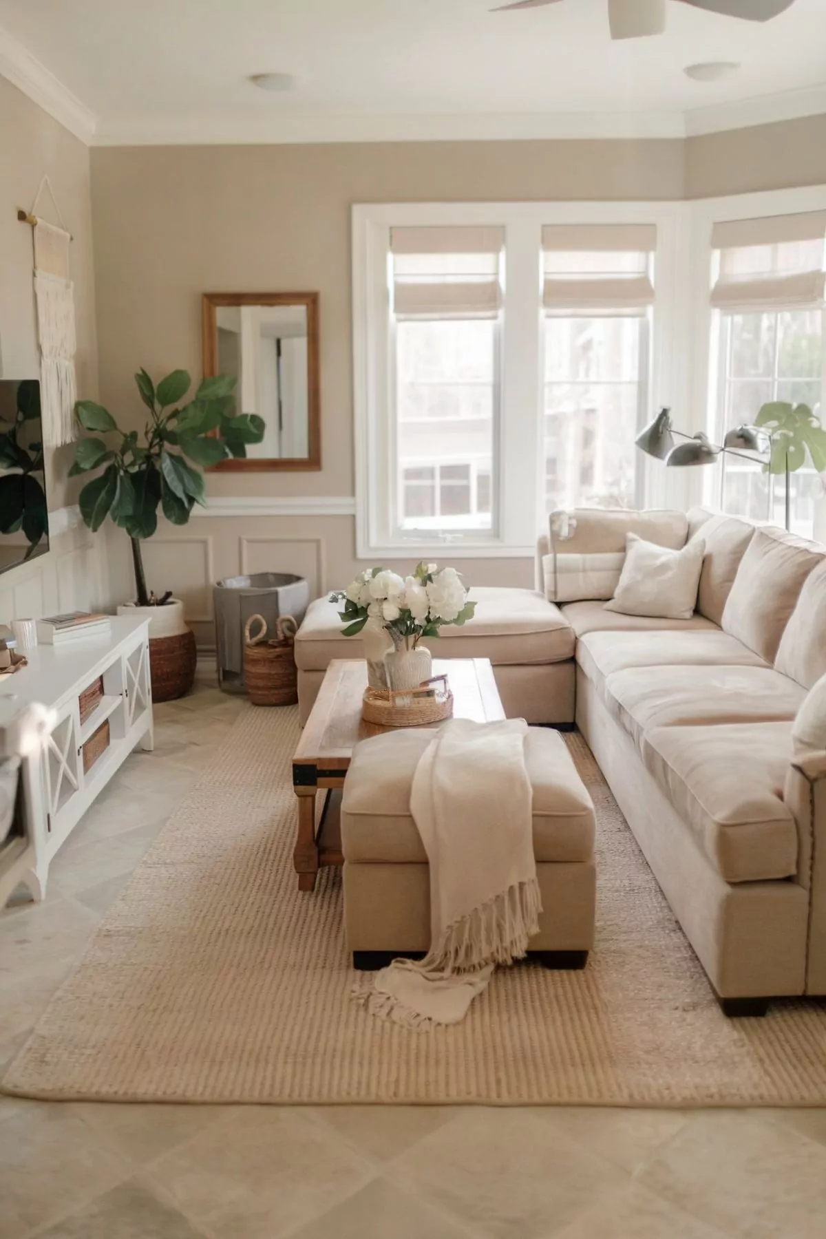 minimalist living room design white chair flower vase on the table