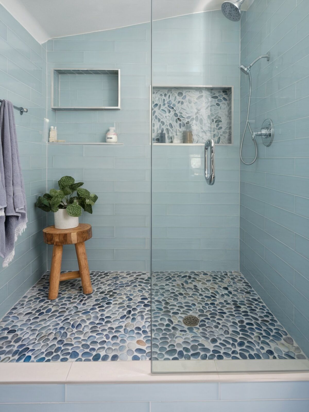coastal bathroom pebble tile a mosaic of blue and white pebble tiled floor