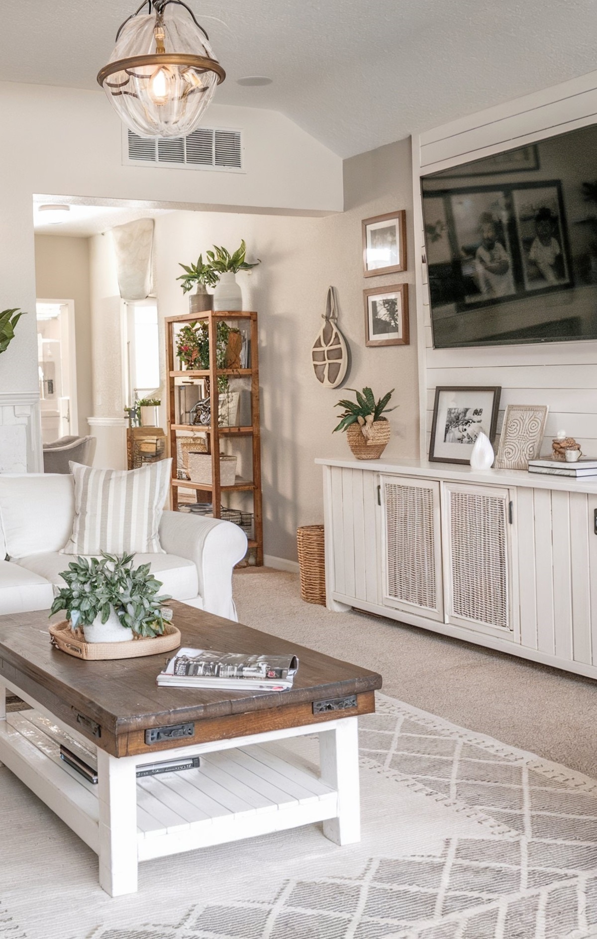 living room tv unit designs country room with white couch and television mounted on a white wall